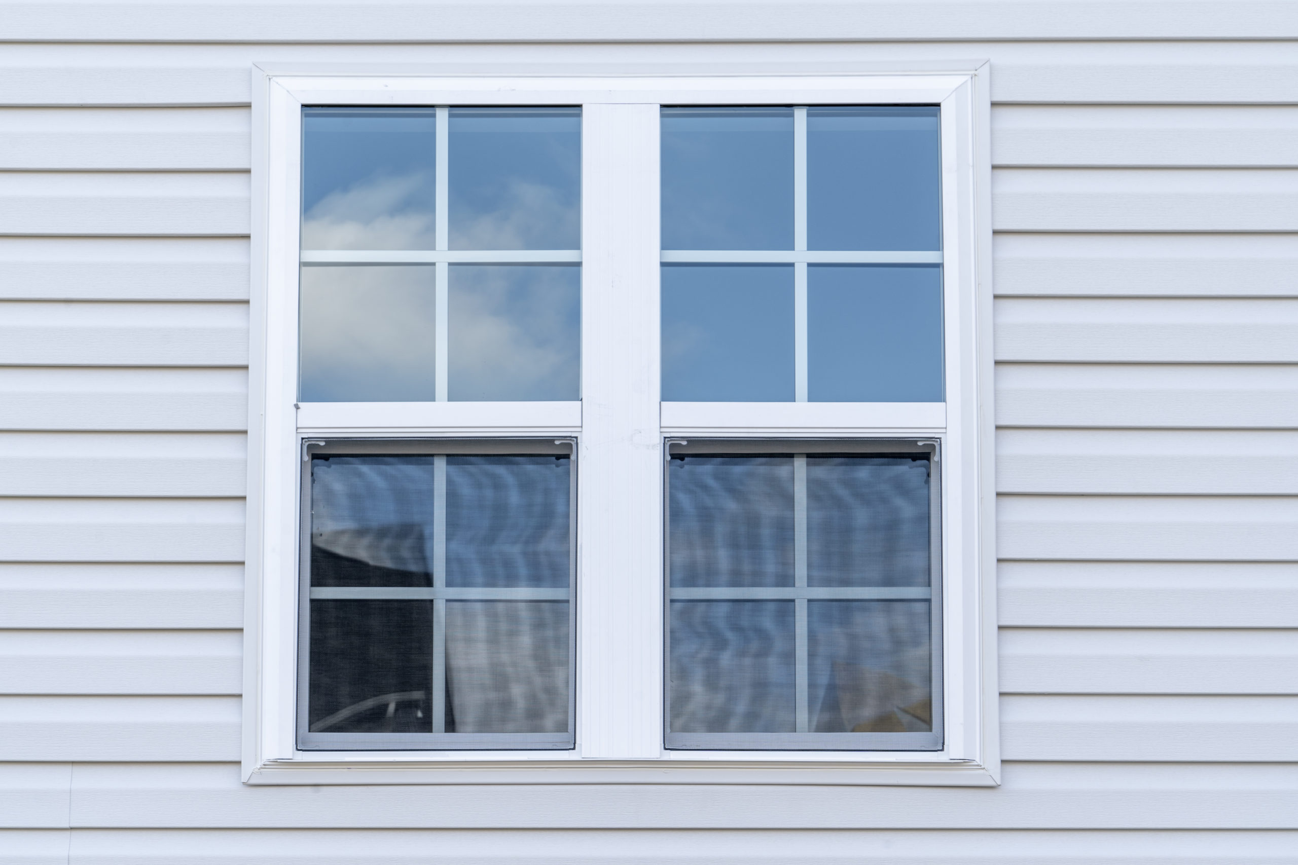 White uPVC sliding sash windows in Maidstone.